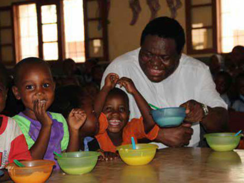 Rev. Fr. Dr. Joseph Kimu during the Nursery Students lunch time